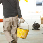 Construction worker with cement.